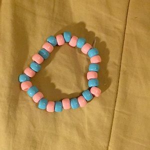 This bracelet is stretchy,cute. And makes you think of a fair. ENJOY my bracelet